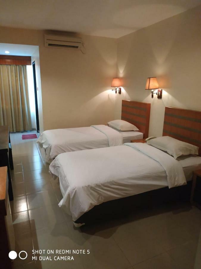 Utama Hotel Batam Habitación foto
